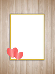 Frame with pink hearts on a wooden texture with an empty white space for text.
