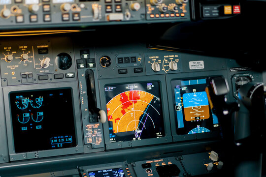 A detailed shot of the radar control and navigation panel in the cockpit of the Boeing 737 Flight Simulator plane