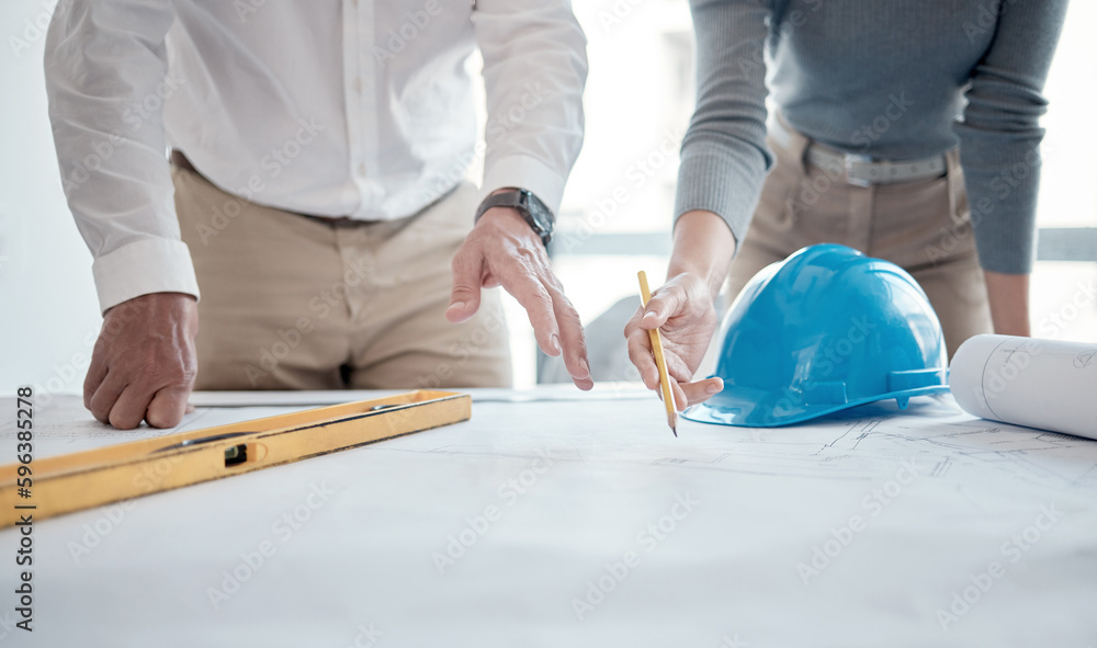 Aufkleber Making sure the plans are up to code. Cropped shot of two unrecognizable architects looking over blueprints in the office.