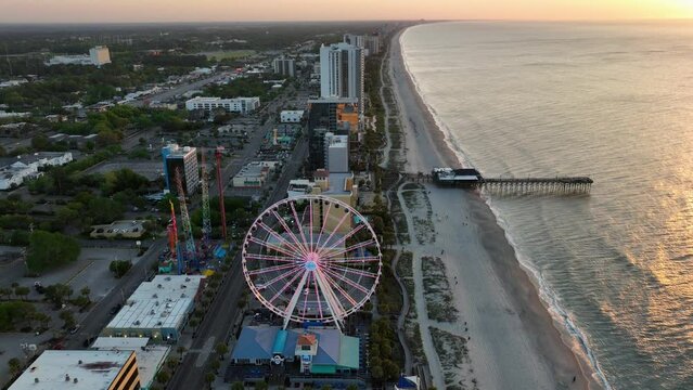 Aerial view of the Myrtle Beach fishing pier during a nice sunrise.