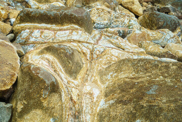 Rock texture with cracks rough mountain surface. Stone granite background for design nature