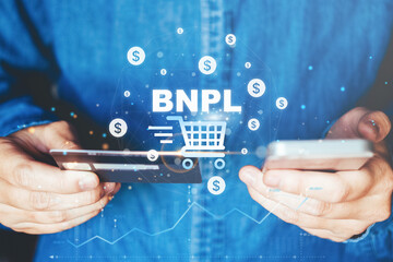 BNPL-Buy Now Pay Later shopping online icon , Online banking businessman using smartphone holding credit card online shopping concept.