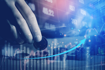 Graph on rows of coins for finance and banking on digital stock market financial exchange analyzing forex trading graph financial data. Business finance technology and investment concept