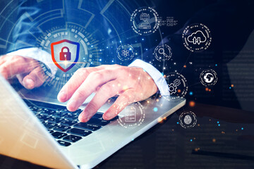 Business man with internet network security technology computer online system and spreading to global stolen personal data on computer with virtual screen interfaces.Cyber security concept