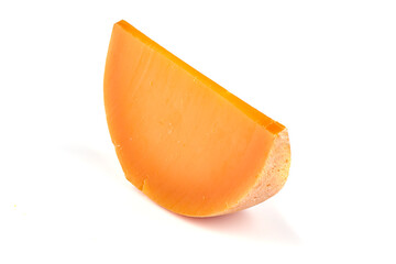 French Mimolette cheese isolated on white background.