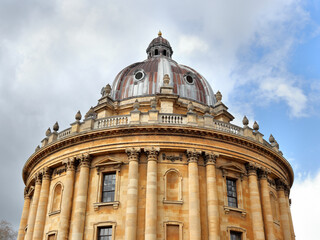 Fototapeta na wymiar Radcliffe Camera, a building of the University of Oxford, England, designed by James Gibbs in neo-classical style and built in 1737–49 to house the Radcliffe Science Library