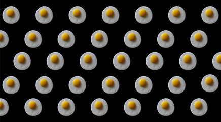Close-up of an appetizing fried egg on a black background, top view