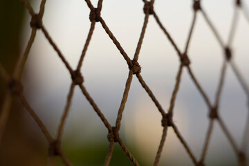 Net close up shot. Abstract background with selective focus. Decoration element.