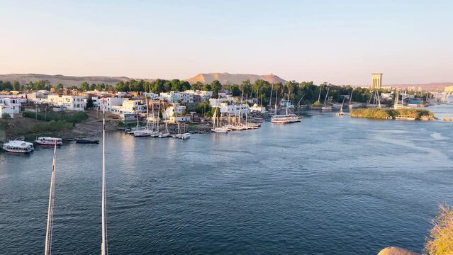 Beautiful landscape with felucca boats on the Nile river in Aswan, Egypt
