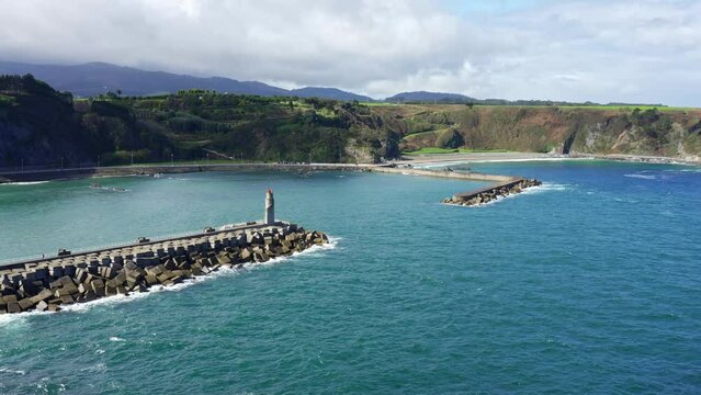 Panoramic view of the entrance to the fishing port of the tourist town of Luarca in northern Spain, Asturias.
