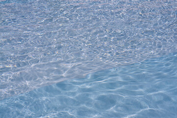 Background shot of aqua sea water surface. Red sea. Blue ocean water texture background. Surface of the sea.