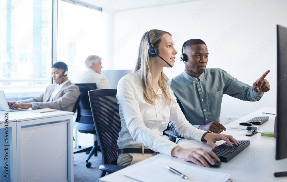Poster your concern is their concern. shot of a businessman and businesswoman using a headset and computer 