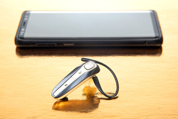 Bluetooth close up with a mobile phone. digital technology of mobile devices in the transmission of...