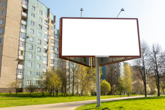 Large blank triangle white billboard in city background. Blank white billboard against the cityscape.