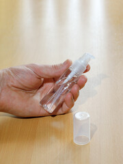 Hand holds portable dispenser antiseptic small with transparent gel