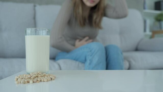 soy allergens, Sick sad unhealthy ill allergic woman, runny stuffy sore nose suffer from intolerance allergy trigger symptoms. abdominal pain, allergens, nut protein, rash, death, food allergy