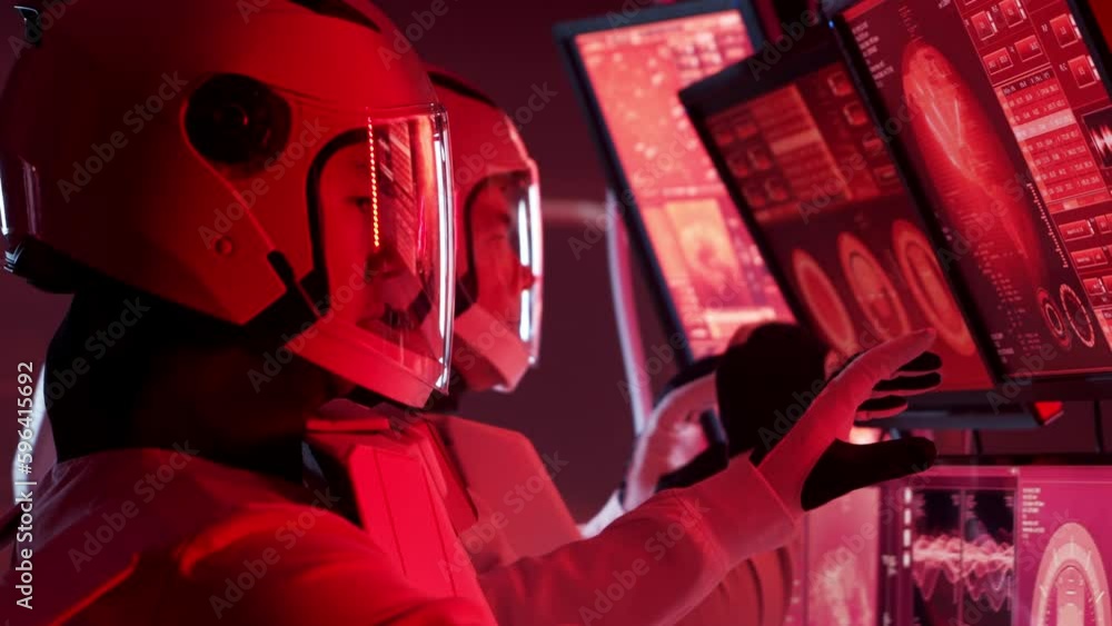 Wall mural team of astronauts in a space suits aboard the mars station. a crew of cosmonauts piloting the space