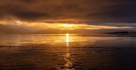 Fototapeta premium Winter sunrise in the fjords in Tromso