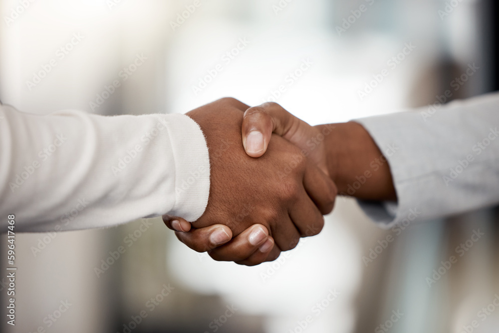Poster heres to new collaborations. shot of two unrecognizable businespeople shaking hands in an office at 