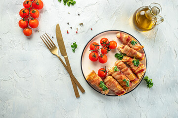 bacon wrapped chicken. Healthy dinner or lunch. Restaurant menu, dieting, cookbook recipe top view