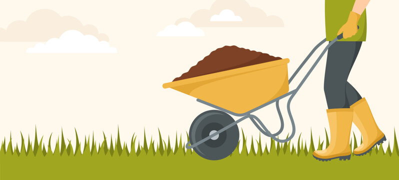 A man in rubber boots and gloves carrying a wheelbarrow with soil on the grass. Vector illustration in flat style