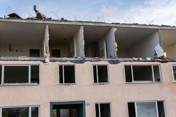 Demolition of low-rise residential building. Reconstruction, restoring damaged building. Destroyed...