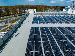 Aerial view of the Spice shopping mall in Riga, Latvia. Roof is covered with solar panels.