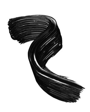 Smudged black mascara on transparent background. Cosmetic product swatch. Paint brush stroke