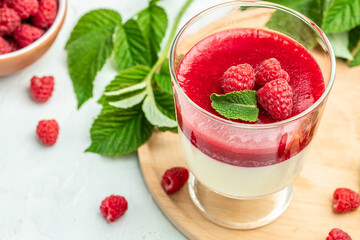 Raspberry jam with berry on light background. Homemade jam with raspberry. banner, menu, recipe place for text, top view