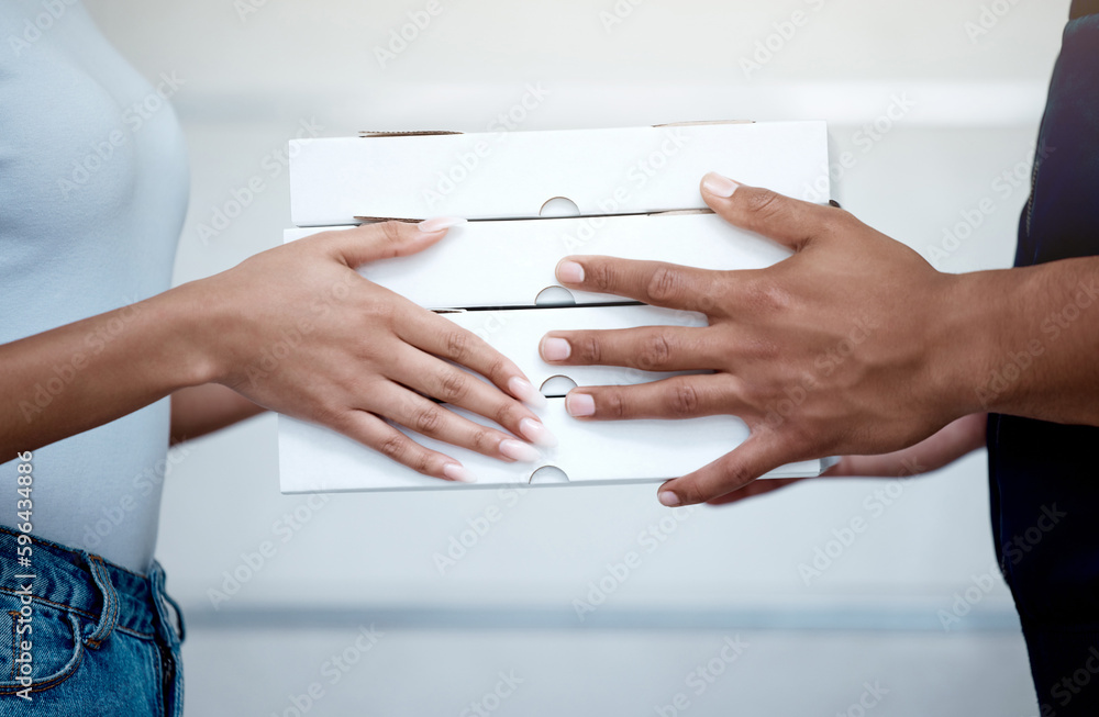 Poster craving pizza order in. closeup shot of an unrecognisable man delivering pizzas to a customer.