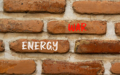 Energy war symbol. Concept words Energy war on beautiful red brown brick wall on beautiful red brown brick wall background. Business and Energy war concept. Copy space.