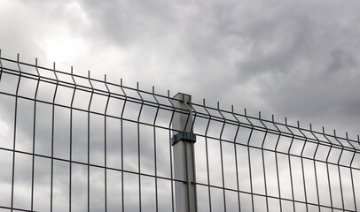 Obraz premium grating wire industrial fence panels. Panel fence