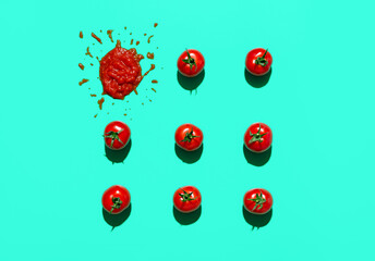 Ketchup sauce concept. Fresh tomatoes and ketchup isoalted on green background.