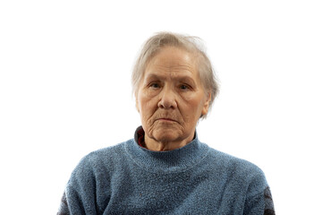 Portrait of an old serious woman on a white background