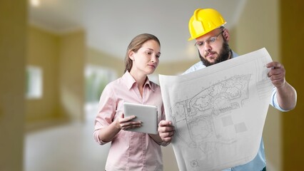 Happy builder people showing renovation plan of house