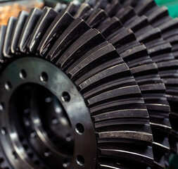 Spur, helical and bevel gears construction and production. Rusted metal