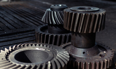 Spur, helical and bevel gears construction and production. Rusted metal