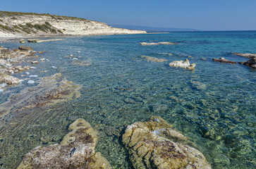 reefs and crystal clear water of Aegean Sea on Alacati coast near Gilikli beach (Cesme, Izmir province, Turkey) 