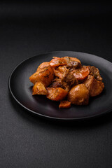 Delicious fresh cooked stew with pork meat or beef with potatoes, carrots, spices and herbs
