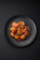 Delicious fresh cooked stew with pork meat or beef with potatoes, carrots, spices and herbs