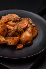 Delicious fresh cooked stew with pork meat or beef with potatoes, carrots, spices and herbs