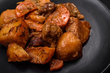 Delicious fresh cooked stew with pork meat or beef with potatoes, carrots, spices and herbs