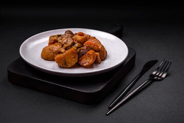 Delicious fresh cooked stew with pork meat or beef with potatoes, carrots, spices and herbs