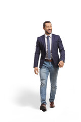 Fototapeta premium Happy professional man walking and smiling