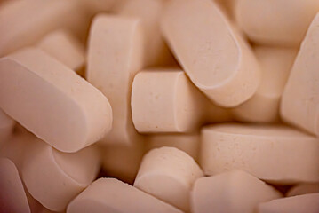 Fototapeta na wymiar close up of pills on white