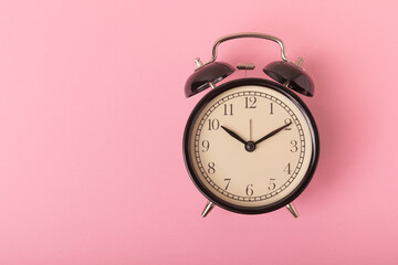 Alarm clock on color background.Good morning concept.  Morning time concept. retro alarm clock on background. WAKE UP. Good morning. flat lay.Banner.