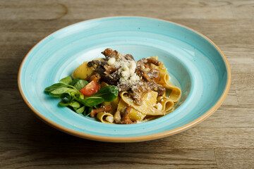 Creamy pasta with chanterelle mushrooms and roasted venison loin