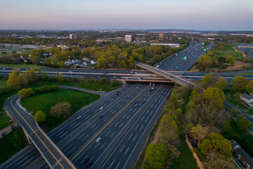 An aerial shot of the highway with overpass in the distance