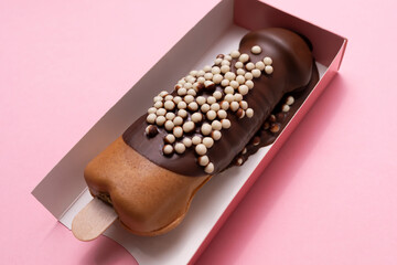 Closeup Penis Shaped Waffle On Wooden Stick With Dark Chocolate, Decorated With White Air Corn...