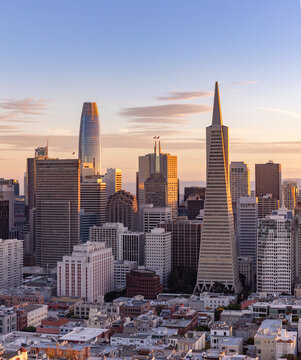 San Francisco, United States - November 25, 2022: A picture of the Transamerica Pyramid, the Salesforce Tower and the surrounding Downtown San Francisco at sunset.